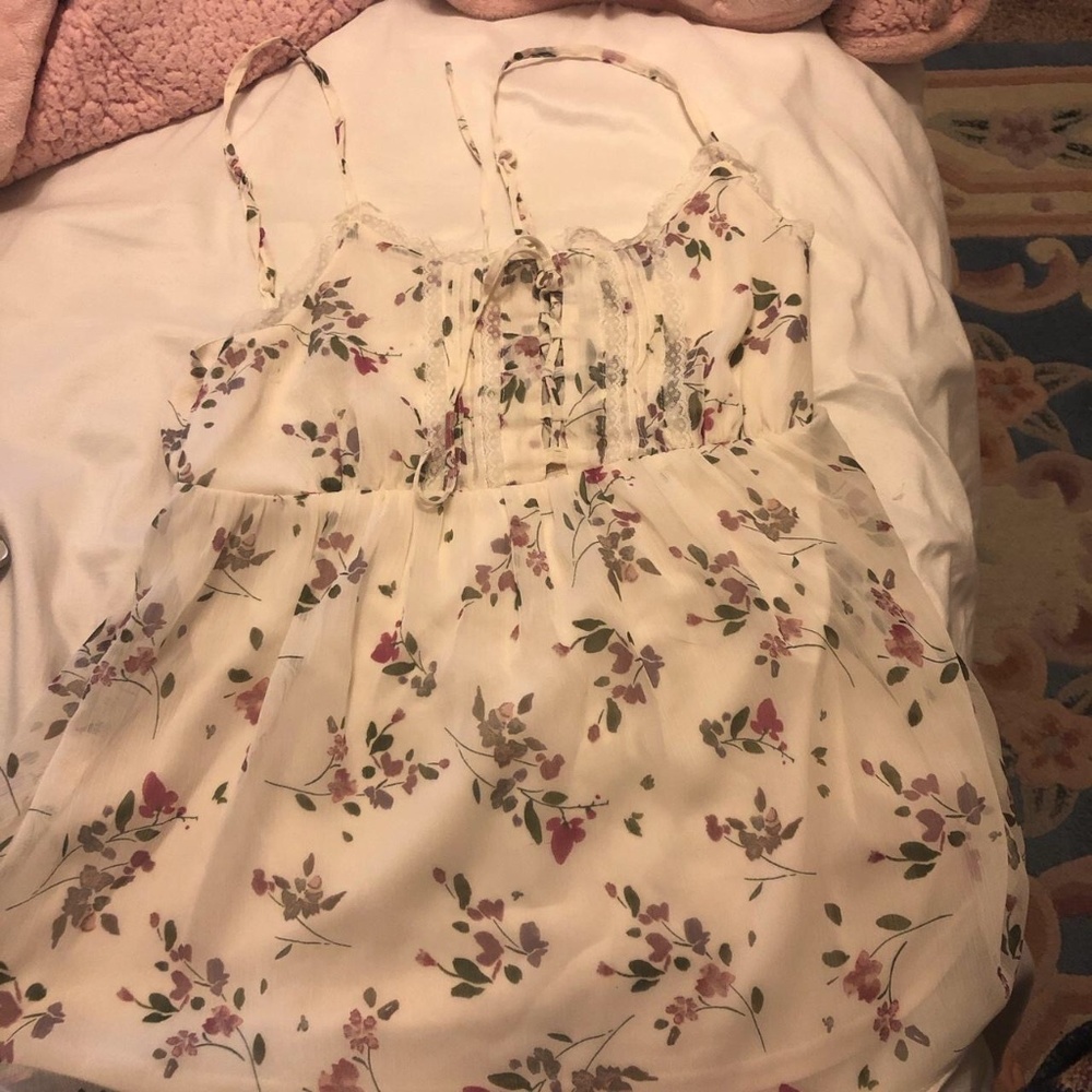white blouse with purple flowers